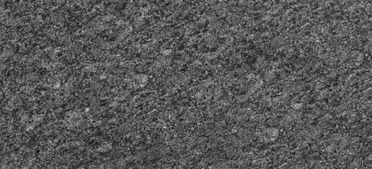 Black stone surface background.
