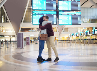 Couple, hug and goodbye at airport for travel, trip or flight in farewell for long distance...