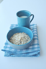  granola Musli and glass of milk on table 
