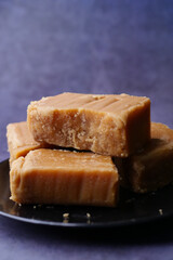  Jaggery traditional cane sugar cube on table 
