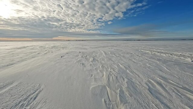 Winter POV Smooth Driving on the Large Snowfield at Sunny Day with Clouds. 60 fps, H.264, 8bit, Chroma Subsamlping 4:4:4