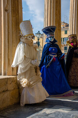 Fototapeta na wymiar Corfu, Greece - February 19, 2023:Beautiful carnival costume posing in Corfu,Greece