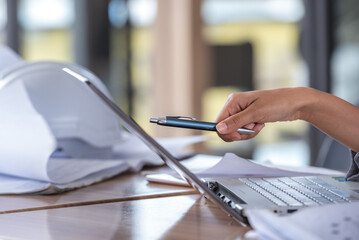 Hand and measuring tool Team work brainstorming many data analyst statistics drawing graph analytics diagram work paper for best solution to explaining Business feasibility, increase sales profit
