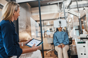 Eye exam, woman doctor tablet and consulting optometrist with patient at clinic. Eyes wellness...