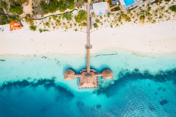 Cercles muraux Plage de Nungwi, Tanzanie Aerial drone photography captures the breathtaking beauty of Zanzibar's crystal clear waters and white sandy beaches in Nungwi.