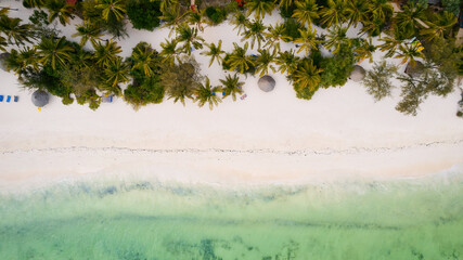 Aerial drone photography captures the breathtaking beauty of Zanzibar's crystal clear waters and...