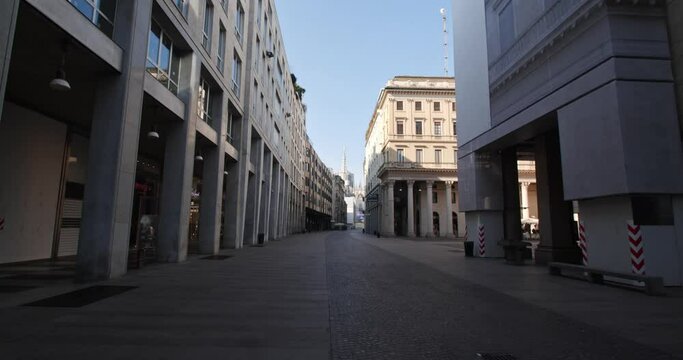 Milan, Italy empty street. Lockdown, Duomo Cathedral in a distance.