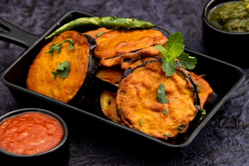 Bengali Eggplant Pakoda Called Begun Bhaja, Baingan Tawa Fry Prepared From Slices Of Brinjal...