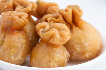 Kalash Gujiya Or Potli Gujia Meetha Also Called Pirukiya, Pirukia, Pedakiya, Karanji, Basundi, Gughra MIthai Is Made Of Suji Ghee Filled With Mawa Khoya Chasni Mava Khoa On Deepawali, Teez, Holi, Teej