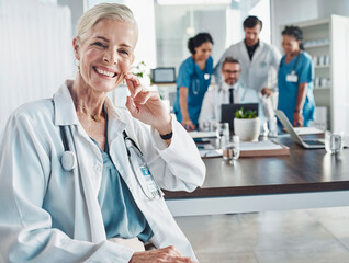 Healthcare, smile and leadership, portrait of woman doctor at desk in hospital for support,...