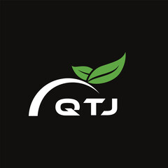 Fototapeta premium QTJ letter nature logo design on black background. QTJ creative initials letter leaf logo concept. QTJ letter design.
