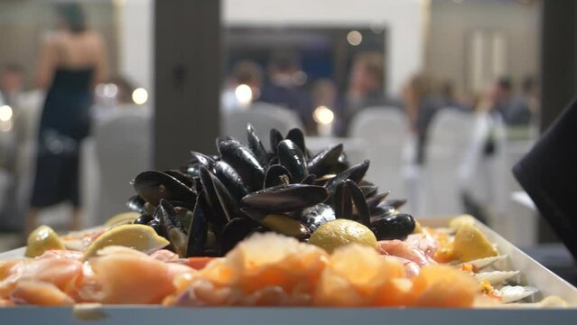 Healthy snacks, sea food and muscles being served at wedding