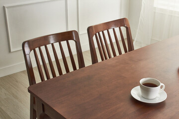 Wood dining table landscape with sunlight.