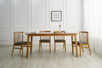 Wood dining table landscape with sunlight.