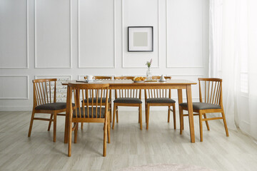 Wood dining table landscape with sunlight.