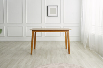 Wood dining table landscape with sunlight.