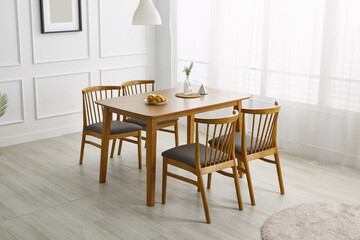 Wood dining table landscape with sunlight.
