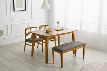 Wood dining table landscape with sunlight.