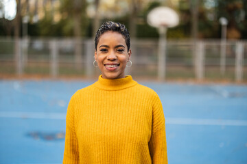 pretty hispanic woman with short hair smiling