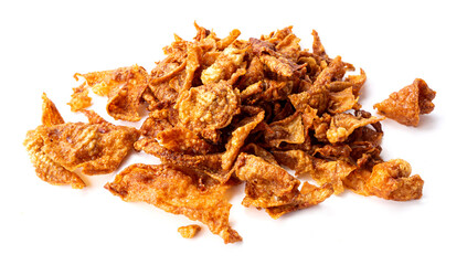 Crispy fried chicken skin on white background, snack food.