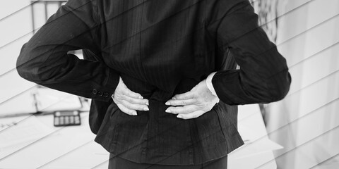 Businesswoman suffering from back pain, geometric pattern