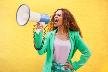 Megaphone, woman and shouting on yellow background of speech, broadcast and protest noise. Female, announcement and screaming voice for justice, news and attention of opinion, gen z speaker and power - obrazy, fototapety, plakaty