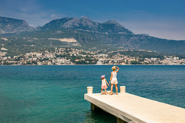 Mother and little daughter travelling in Montenegro