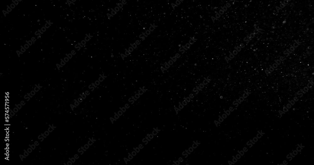 Sticker vertical dust particles system floating on black screen overlay. red camera footage in slow motion. 