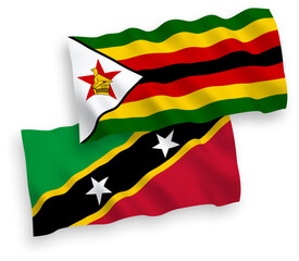 Flags of Federation of Saint Christopher and Nevis and Zimbabwe on a white background