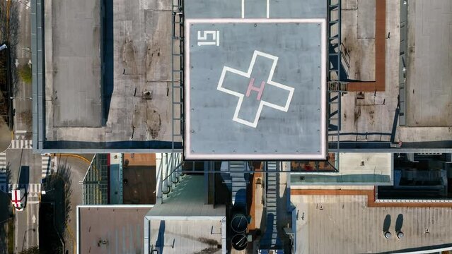 Overhead View Of Surrey Memorial Hospital Helipad On Top Of Their Building In Canada. - aerial