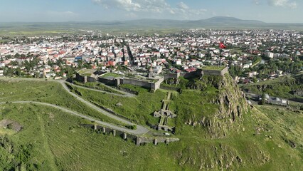Fototapeta na wymiar A photo of the city of Kars taken with a drone. Kars Castle and the old city center.