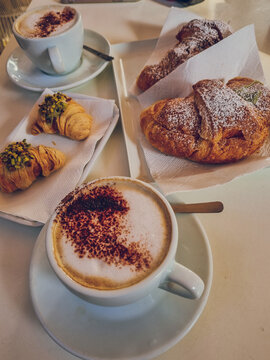 Italian breakfast with Pistachio croissant(corneto) and capuccino