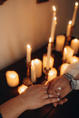 wedding ring, atmosphere of candles and romance