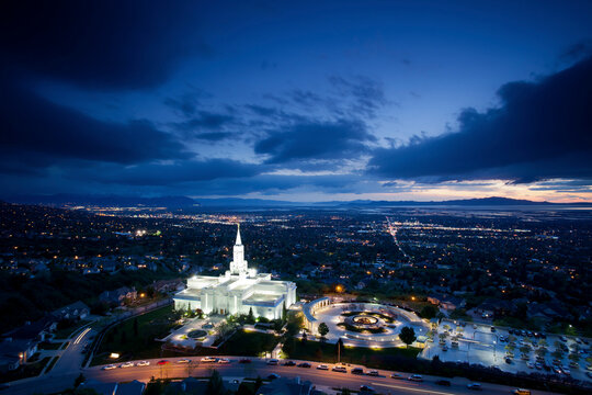 The Mormon (LDS) Temple in Bountiful Utah sits above the Great Salt Lake at dusk.