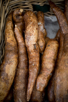 Yams are sold in an outdoor market in Lisbon, Portugal.