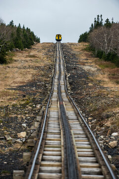 Train heading up the tracks toward the summit of Mount Washington.
