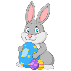 Cute bunny cartoon holding easter eggs