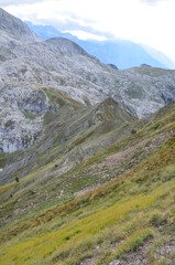 Fototapeta premium The mountains of the Prokletije National Park in the autumn near the Grebaje Valley of Montenegro. The Accursed Mountains. Albanian Alps.