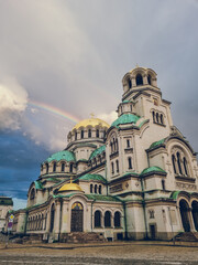 Fototapeta premium Alexander Nevsky Cathedral with a rainbow in the background, Sofia, Bulgaria