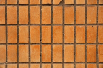 Beige facing tile on a wall