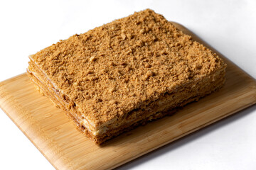 cake Medovik on white background. Close up view