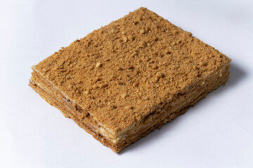 cake Medovik on white background. Close up view