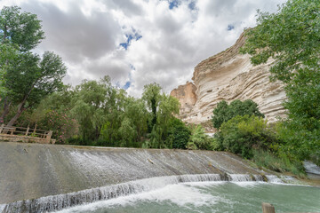 Stone ramp over the Jucar river in the recreational area of Alcala del Jucar. Province of Albacete. Spain