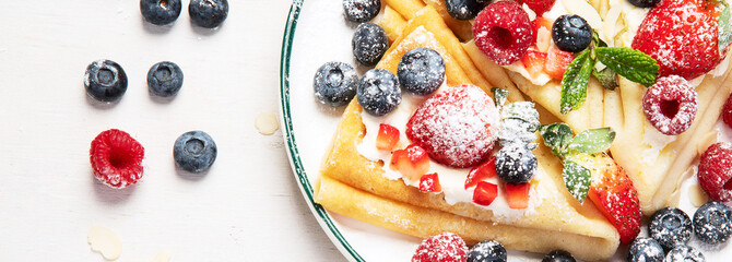 Healthy breakfast, homemade traditional crepes or pancakes