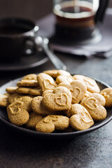 Sweet gingerbread hearts on plate.