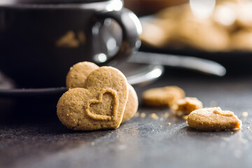 Sweet gingerbread hearts and coffee cup.