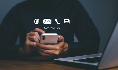 Contact us or Customer support hotline people connect. Businessman using a mobile phone