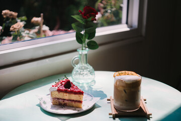 strawberry cake and americano orange coffee