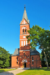Fototapeta na wymiar Neo-Gothic church of St. Stanisław Kostka, Karolewo, Warmian-Masurian Voivodeship, Poland.