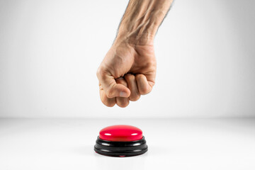 Back of Fist About to Slam Big Red Button